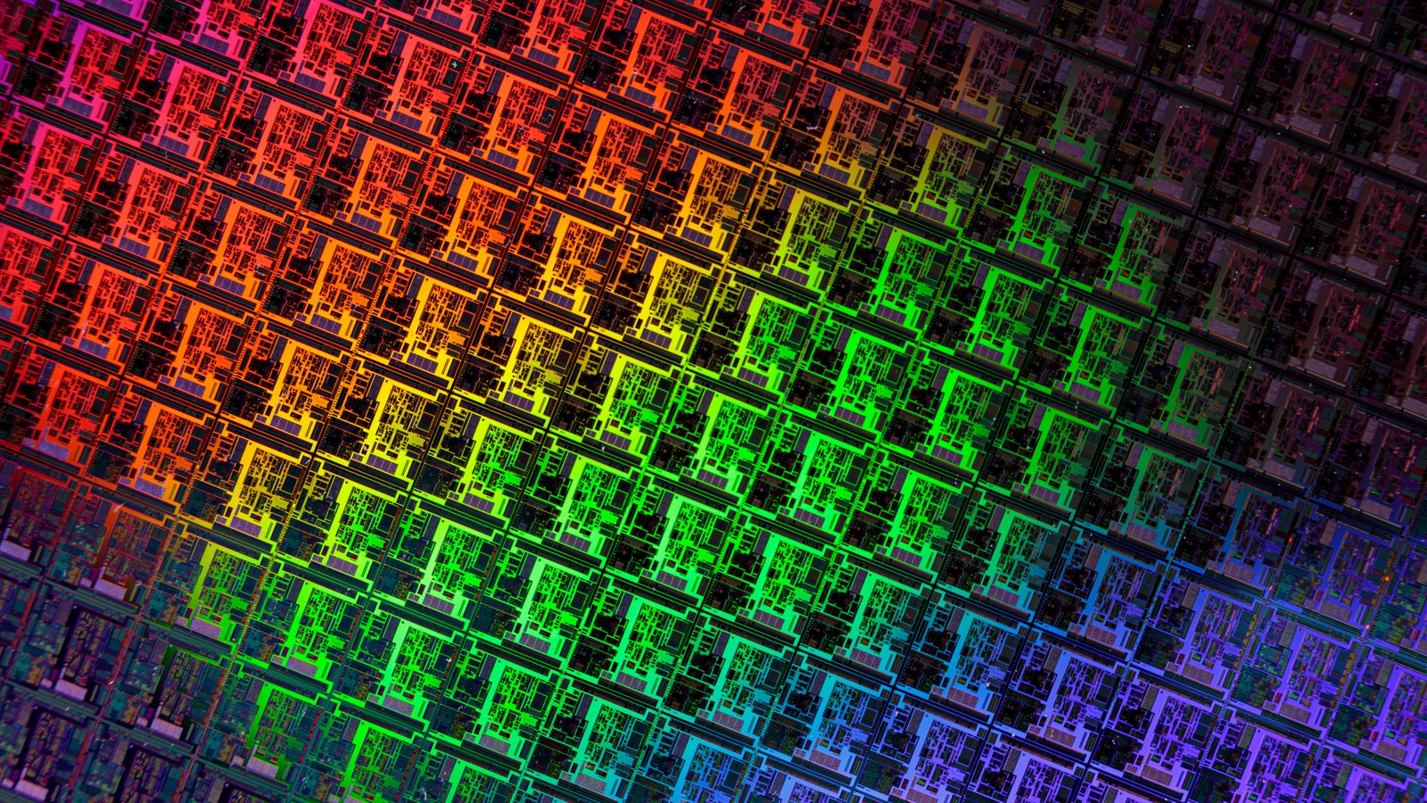Close-up photograph of a colorful silicon wafer used to make semiconductor chips