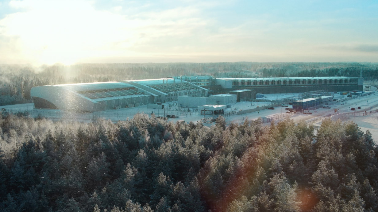 Nebius official data-center campus image in a snowy forest setting.