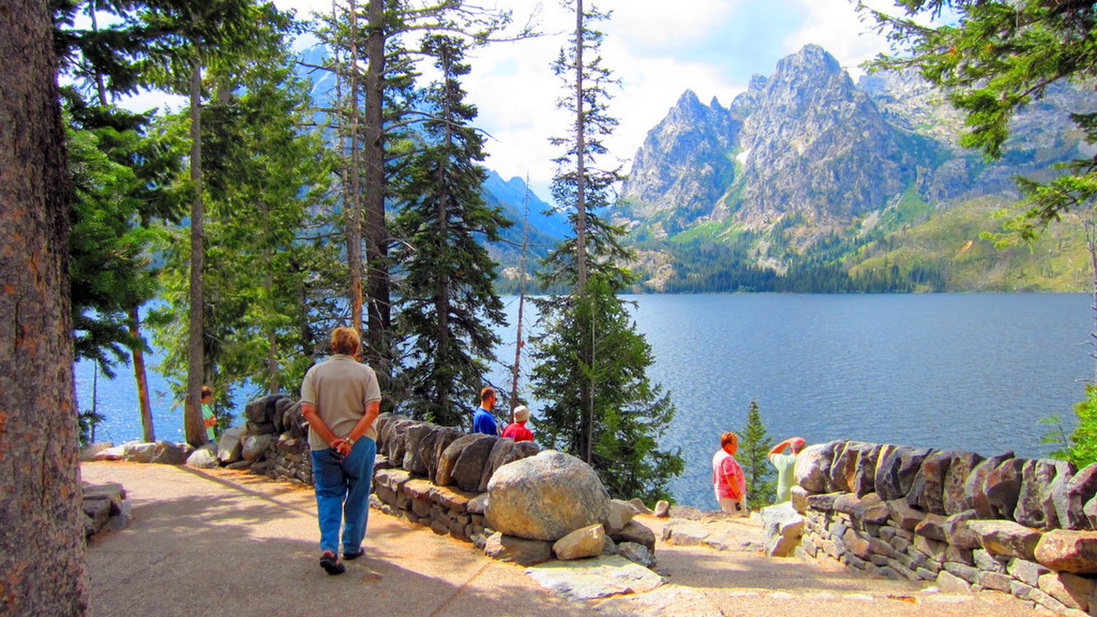 Jenny Lake and the Teton Range near Jackson Hole under a blue sky