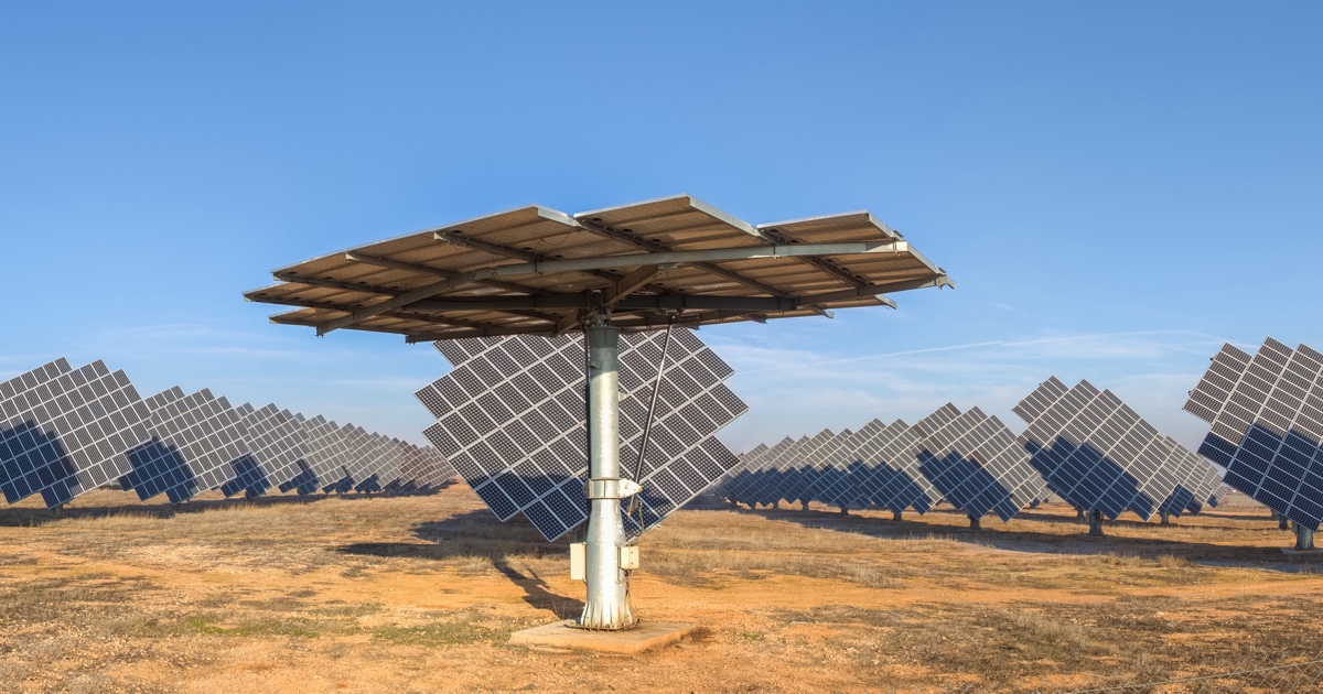 Dual-axis solar trackers follow the sun at a photovoltaic power station in Cariñena, Spain.