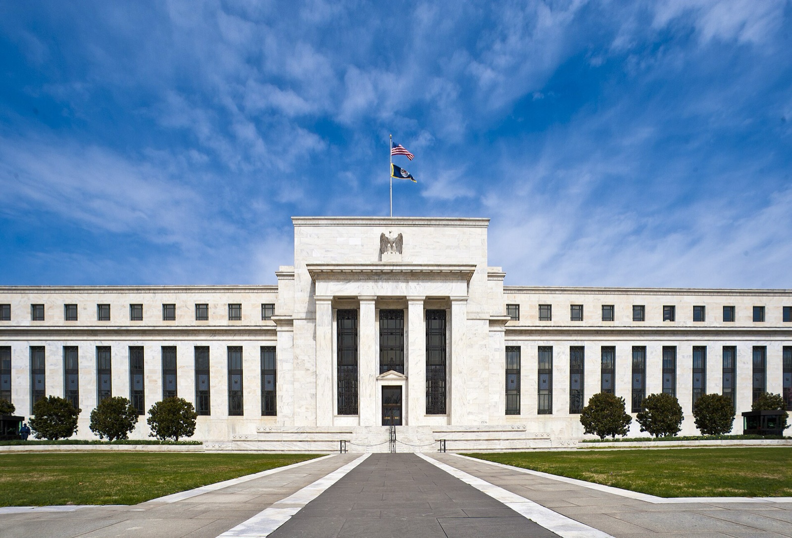 The Federal Reserve's Eccles Building in Washington, D.C., under a blue sky