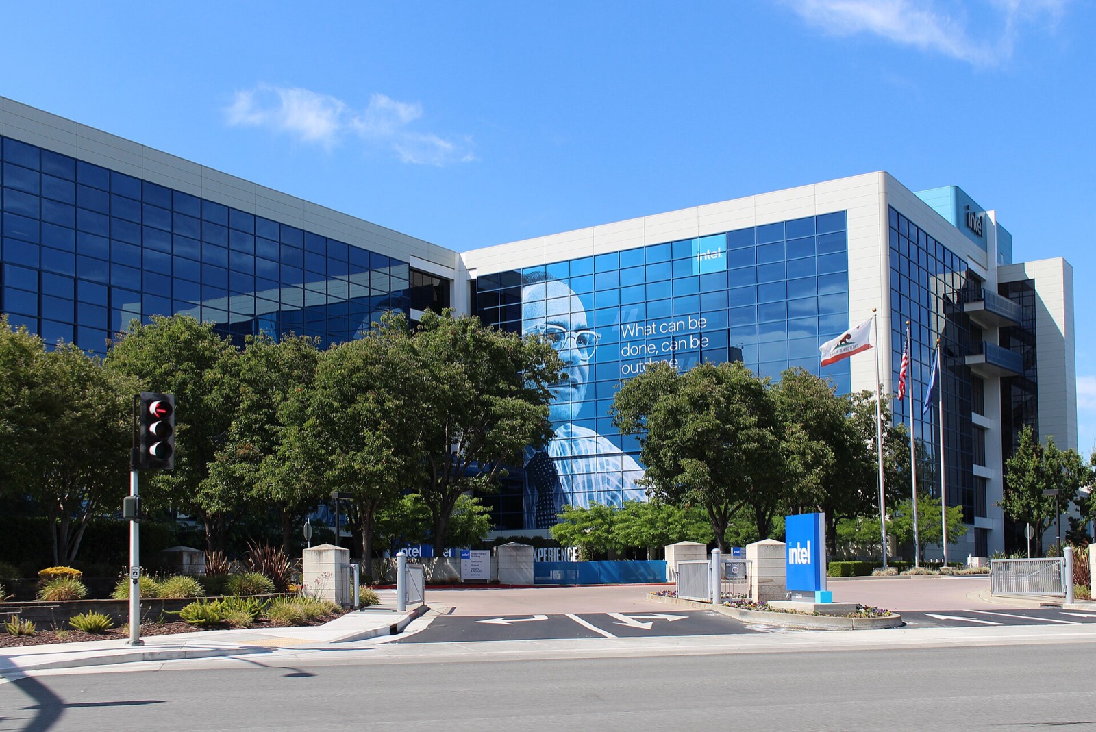 Intel's headquarters building at 2200 Mission College Boulevard in Santa Clara, California, under a blue sky
