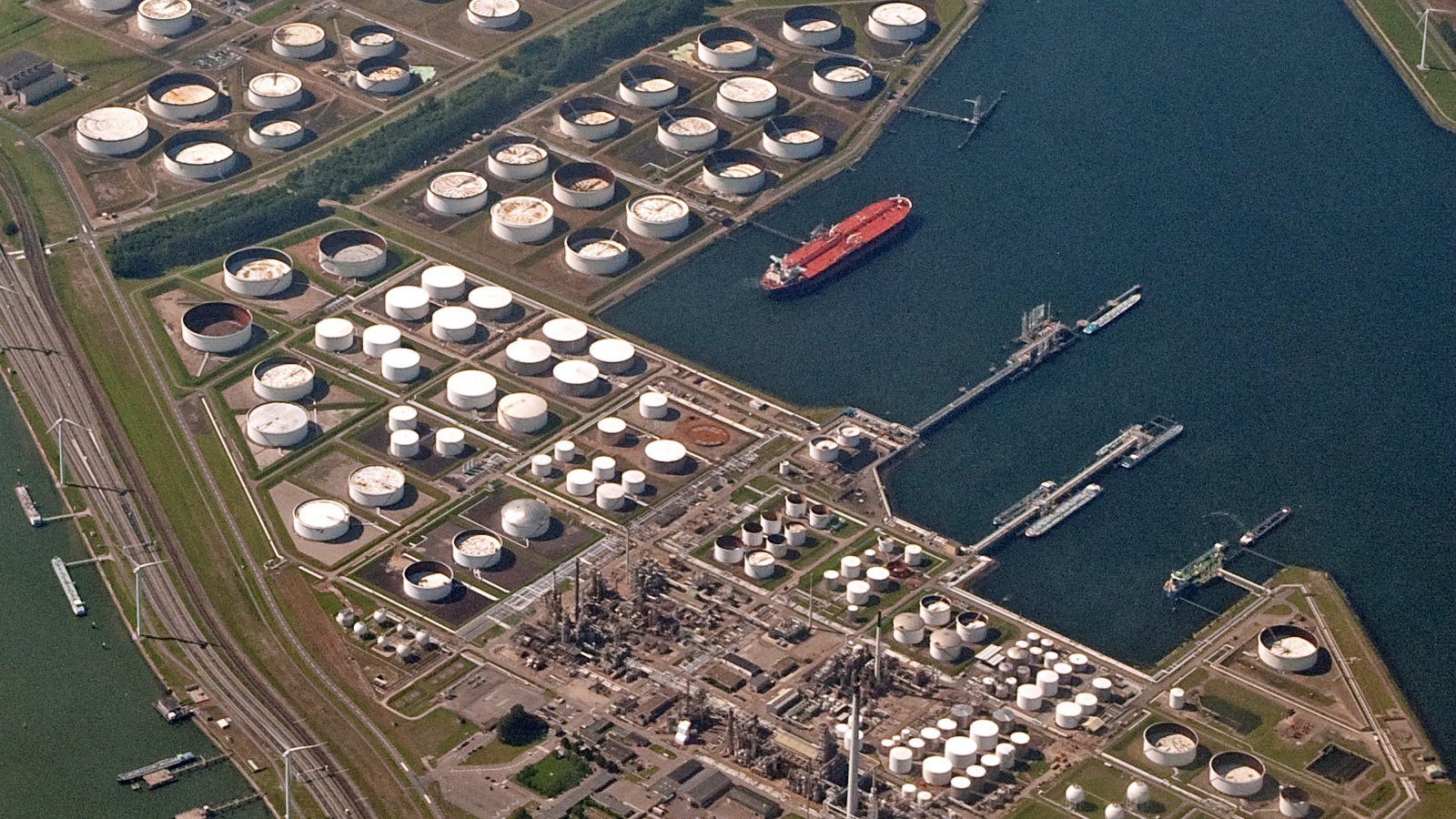Oil storage tanks and port infrastructure at Europoort, Rotterdam; archival aerial photograph from June 2014