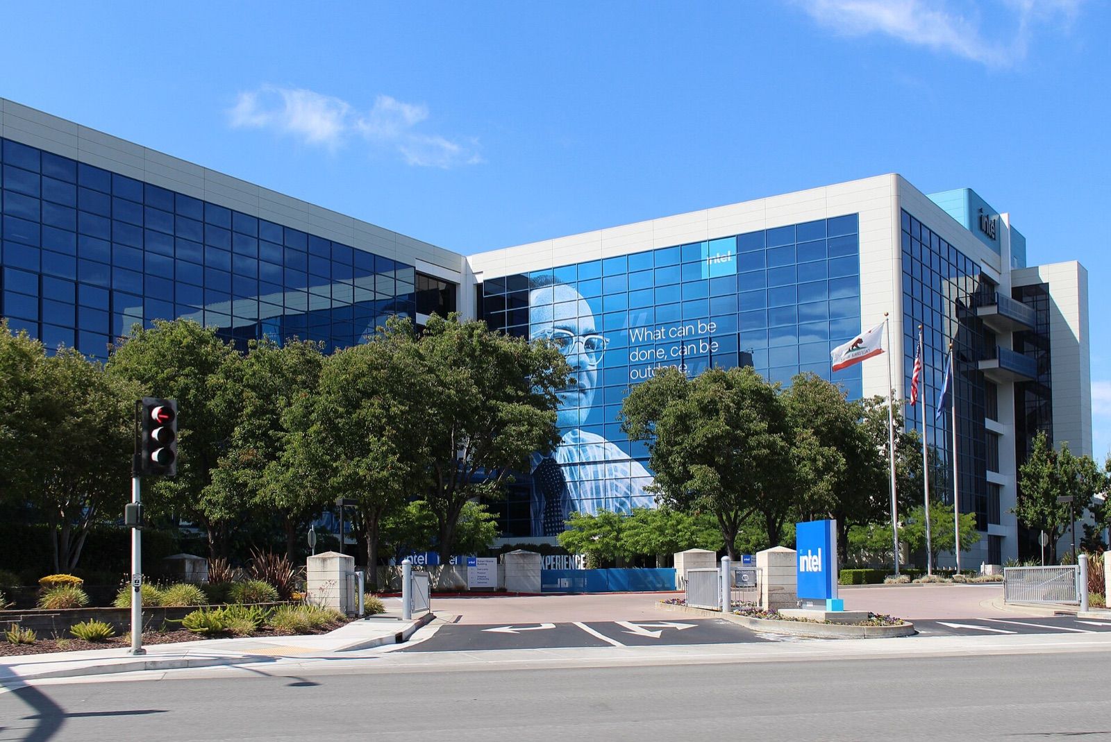 Intel's headquarters building at 2200 Mission College Boulevard in Santa Clara, California, under a blue sky
